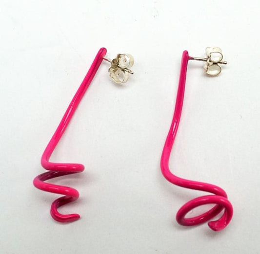 Margaret Jacobs Pink Swirl Earrings Margaret Jacobs makes boldly colored jewelry with a contemporary flair. These are post earrings made from powder-coated steel. 1 3/4" high