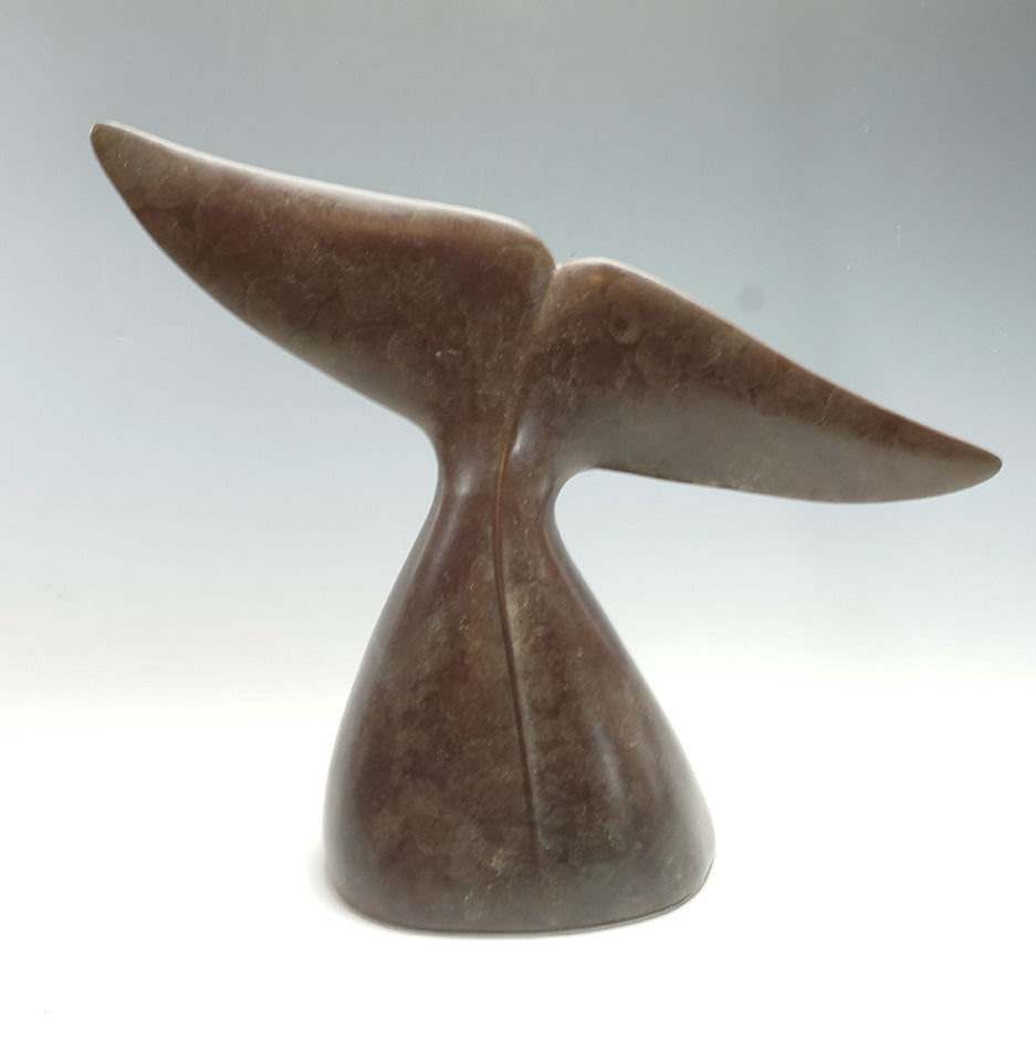 Cast bronze whale fluke by David Ruben Piqtoukun