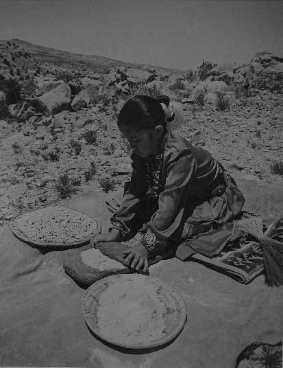 Grinding White Indian Corn