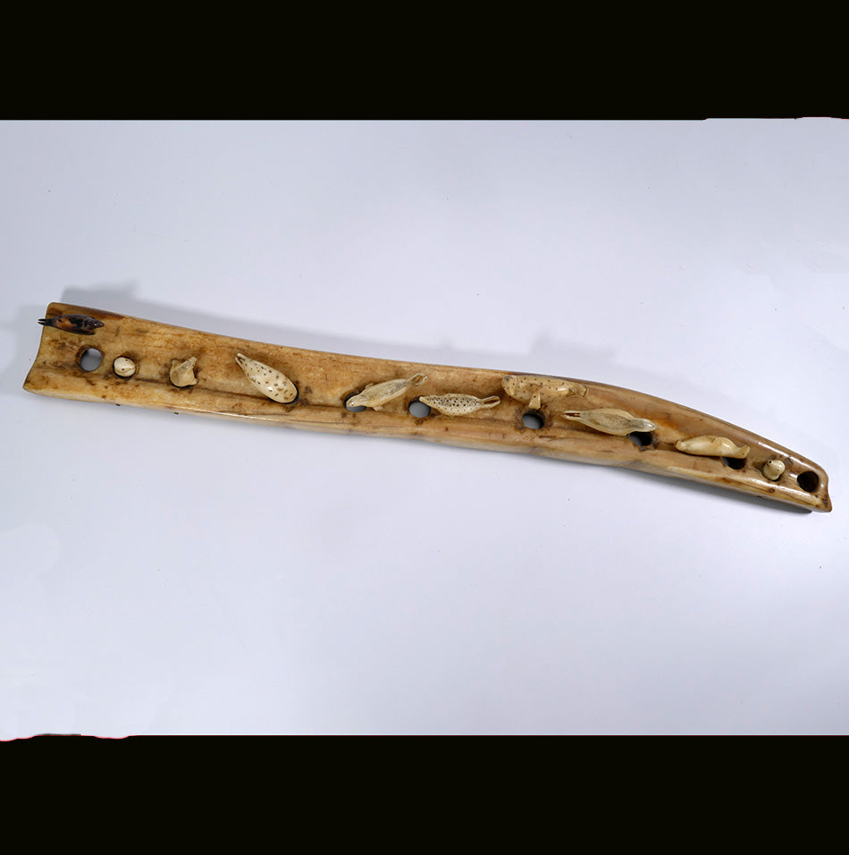 Ten seals on an ice flow Alaskan Eskimo Ivory