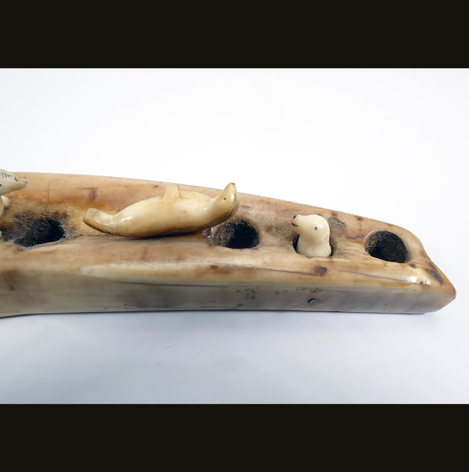 Ten seals on an ice flow Alaskan Eskimo Ivory