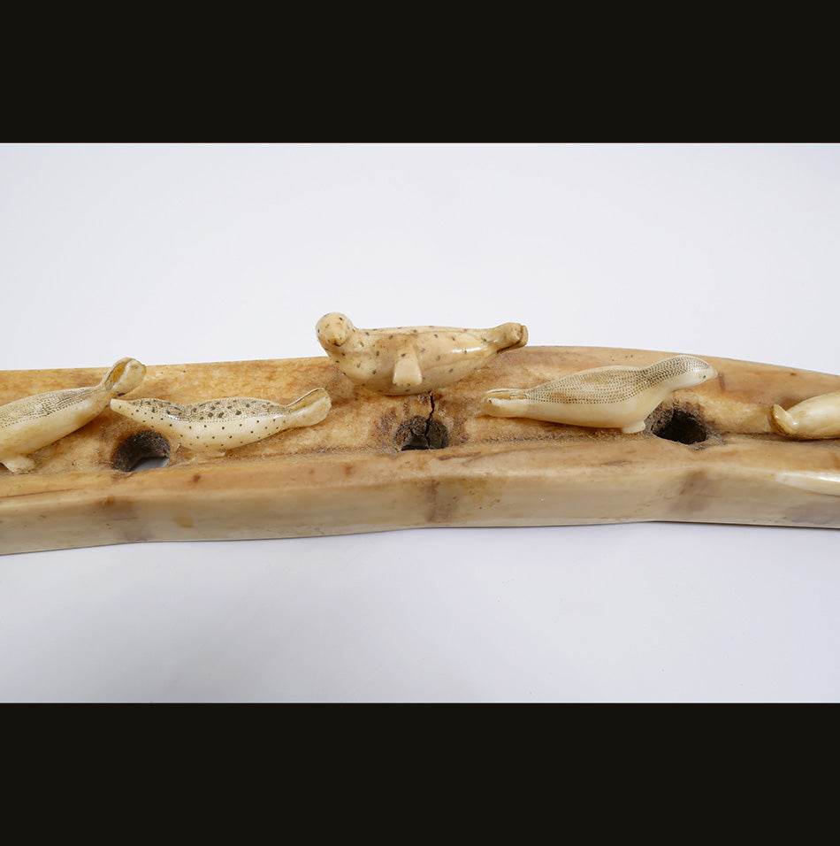 Ten seals on an ice flow Alaskan Eskimo Ivory